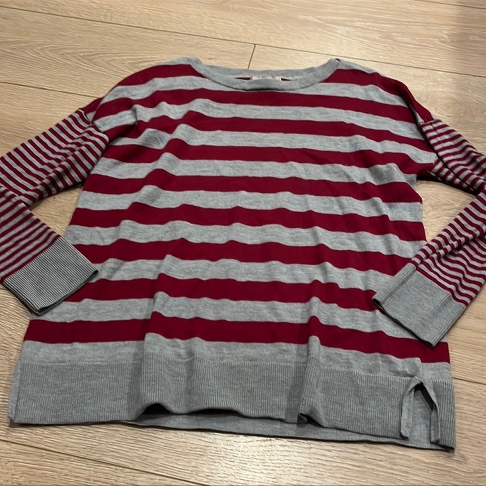 This sweater is an XL but runs very small excellent condition